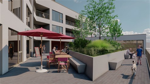Moderne commerciële ruimte in opkomende wijk met parkeerplaats en kelder