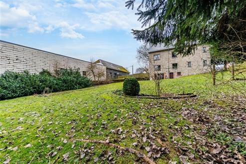 Versatile apartment building with large garden and potential in the center of Büllingen