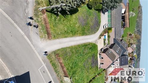 Die Residenz « Les Grains d'Orges »: Neubauwohnungen, die Komfort, Natur und modernes Wohnen vereinen und eine außergewöhnliche Lebensqualität im Herzen des Dorfes Homburg bieten.