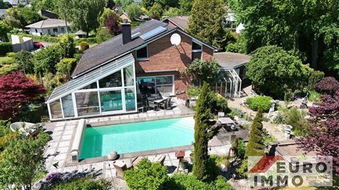 Ein elegantes Zuhause mit Seele und Charakter:  EFH-Juwel mit Pool, Wintergarten und Wohlfühlgarten in naturnaher Lage mit perfekter Anbindung