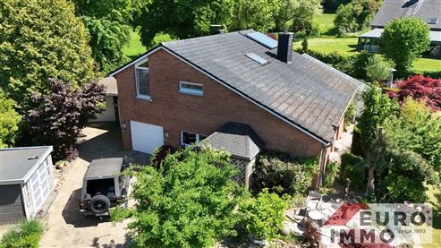 Ein elegantes Zuhause mit Seele und Charakter:  EFH-Juwel mit Pool, Wintergarten und Wohlfühlgarten in naturnaher Lage mit perfekter Anbindung