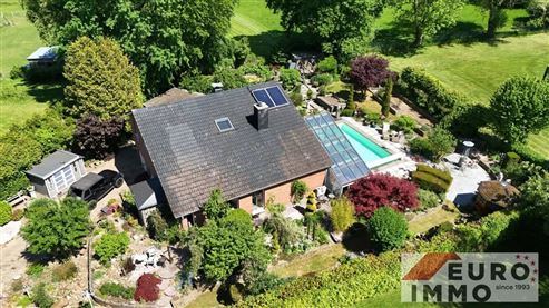 Ein elegantes Zuhause mit Seele und Charakter:  EFH-Juwel mit Pool, Wintergarten und Wohlfühlgarten in naturnaher Lage mit perfekter Anbindung