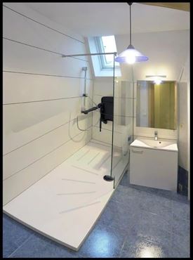 Lichtdurchflutete Wohnung in Malmedy – stilvolles Wohnen mit Sonnenterrasse, Balkon, Tiefgarage und Naturanbindung in zentraler Lage
