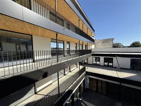 Zentral Wohnen, entspannt leben: Stilvolle Neubauwohnung im Erstbezug mit Terrasse & Garagenstellplatz