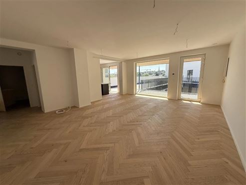 Zentral Wohnen, entspannt leben: Stilvolle Neubauwohnung im Erstbezug mit Terrasse & Garagenstellplatz
