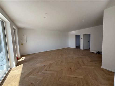 Zentral Wohnen, entspannt leben: Stilvolle Neubauwohnung im Erstbezug mit Terrasse & Garagenstellplatz