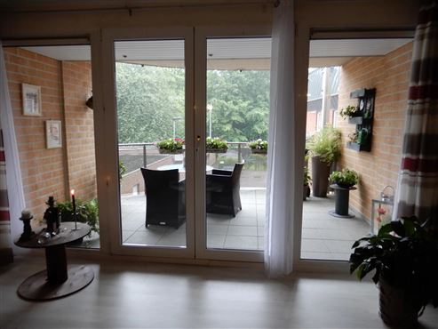 Im Herzen von Eupen – zeitgemäße und elegante Stadtwohnung mit großer Terrasse, Parkblick, Tiefgaragenstellplatz und Keller!