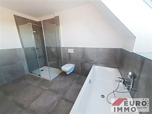 Stilvolles und modernes Wohnen nahe aller Annehmlichkeiten im Grenzgebiet – Duplex-Wohnung mit Gartennutzung und Garage