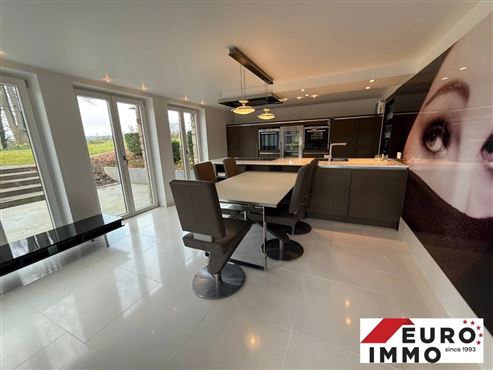 Exklusivität & Luxus an der Grenze in ruhigem und naturnahem Umfeld – Ein-Schlafzimmer-Wohnung mit Sauna, Terrasse und hochwertiger Einbauküche