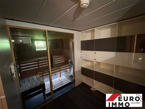 Exklusivität & Luxus an der Grenze in ruhigem und naturnahem Umfeld – Ein-Schlafzimmer-Wohnung mit Sauna, Terrasse und hochwertiger Einbauküche