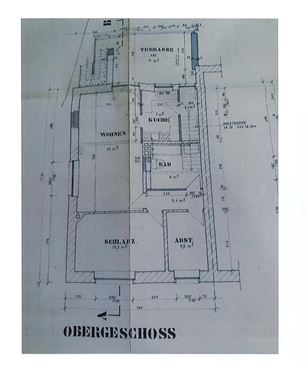 Charaktervolles Bruchsteinhaus mit drei Wohneinheiten inkl. Garagen, Terrassen und Garten: vielseitige Immobilie für Investoren oder zur Eigennutzung!