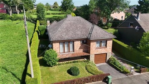 Gepflegter freistehender Bungalow mit Wintergarten und teilweise ausgebautem Keller in begehrter Wohnlage von Eupen