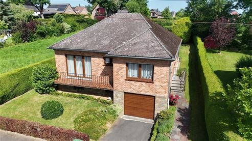 Gepflegter freistehender Bungalow mit Wintergarten und teilweise ausgebautem Keller in begehrter Wohnlage von Eupen