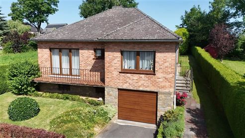 Gepflegter freistehender Bungalow mit Wintergarten und teilweise ausgebautem Keller in begehrter Wohnlage von Eupen