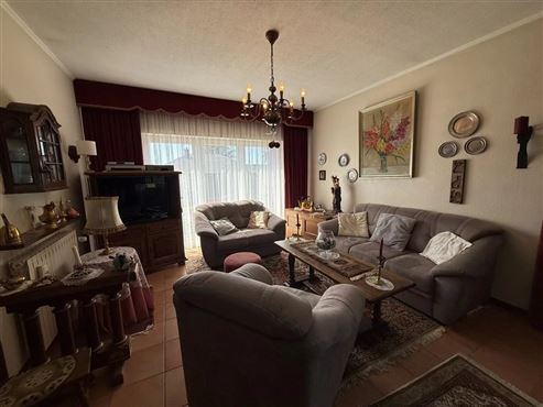 Gepflegter freistehender Bungalow mit Wintergarten und teilweise ausgebautem Keller in begehrter Wohnlage von Eupen