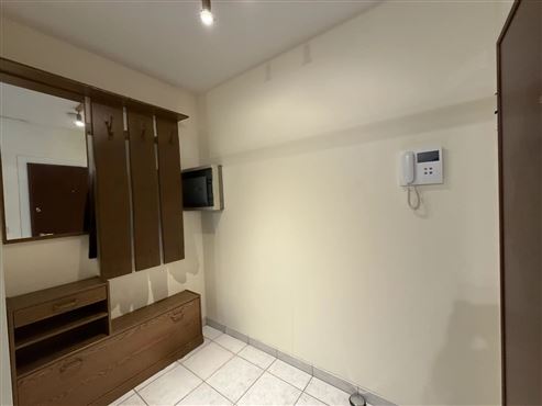 Angenehmes Wohnen im Grünen in hervorragender Lage in Etterbeek – Großzügige Wohnung mit Balkon, privatem Gemeinschaftsgarten, Tiefgaragenstellplatz und Keller