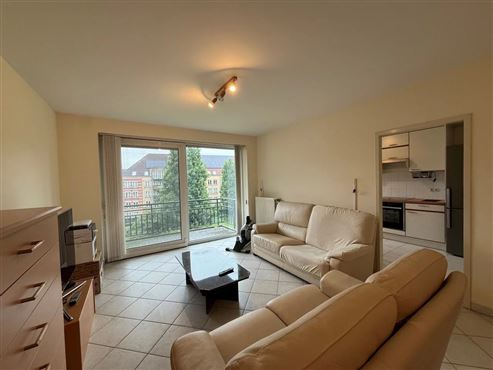 Angenehmes Wohnen im Grünen in hervorragender Lage in Etterbeek – Großzügige Wohnung mit Balkon, privatem Gemeinschaftsgarten, Tiefgaragenstellplatz und Keller