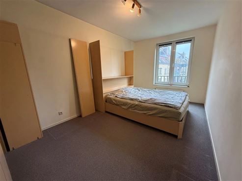 Angenehmes Wohnen im Grünen in hervorragender Lage in Etterbeek – Großzügige Wohnung mit Balkon, privatem Gemeinschaftsgarten, Tiefgaragenstellplatz und Keller