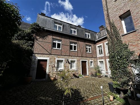 Attraktive Kapitalanlage im Herzen von Eupen: Mehrfamilienhaus mit zehn Wohneinheiten, breiter Mieterstruktur, gepflegtem Bestand und zusätzlichem Entwicklungs- und Mietsteigerungspotenzial