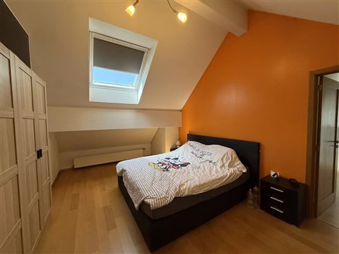 Wohnen im Grünen mit besonderem Charakter:  Duplexwohnung mit weitläufigem Garten