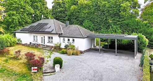 Großzügige Bungalow-Villa mit weitläufigem Garten und vielseitigem Wohnpotenzial im Dreiländereck und Grenzlage