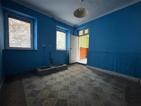 Großes Sanierungspotenzial in Zentrumsnähe von Eupen: Geräumiges Einfamilienhaus mit Innenhof