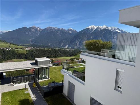 Design- & Wohlfühl-Highlight – Traumhafte 4-Zimmer-Gartenwohnung mit Terrasse und Panoramablick im Tiroler Mittelgebirge ( Österreich)