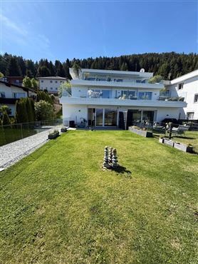 Design- & Wohlfühl-Highlight – Traumhafte 4-Zimmer-Gartenwohnung mit Terrasse und Panoramablick im Tiroler Mittelgebirge ( Österreich)