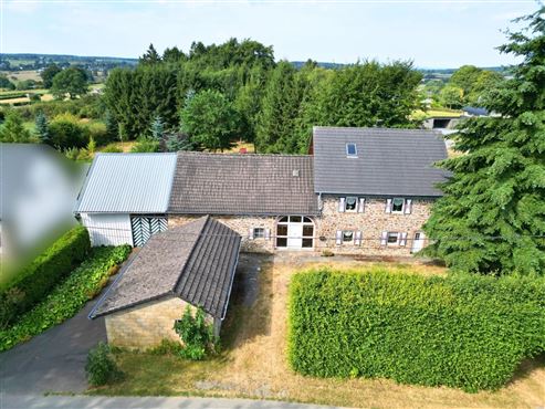 Außergewöhnliches Anwesen mit traumhaftem Garten in ruhiger Lage von Hünningen