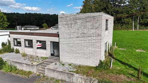 Bestehende Gewerbeimmobilie mit attraktivem Umnutzungspotenzial zum Einfamilienhaus in direkter Grenz – und Waldrandlage auf Köpfchen