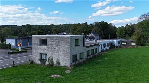 Bestehende Gewerbeimmobilie mit attraktivem Umnutzungspotenzial zum Einfamilienhaus in direkter Grenz – und Waldrandlage auf Köpfchen