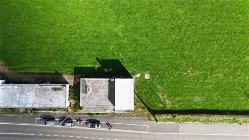 Bestehende Gewerbeimmobilie mit attraktivem Umnutzungspotenzial zum Einfamilienhaus in direkter Grenz – und Waldrandlage auf Köpfchen