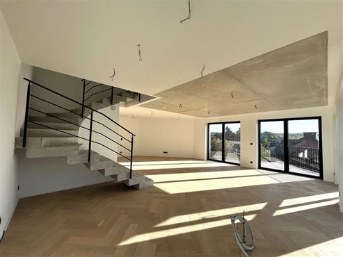 Exklusive und stilvolle Duplexwohnung im Erstbezug mit großer Terrasse und Tiefgaragenstellplatz im Herzen von Eupen
