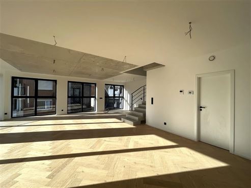 Exklusive und stilvolle Duplexwohnung im Erstbezug mit großer Terrasse und Tiefgaragenstellplatz im Herzen von Eupen