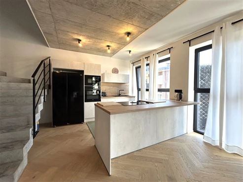 Exklusive und stilvolle Duplexwohnung im Erstbezug mit großer Terrasse und Tiefgaragenstellplatz im Herzen von Eupen