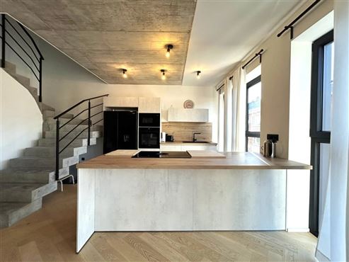 Exklusive und stilvolle Duplexwohnung im Erstbezug mit großer Terrasse und Tiefgaragenstellplatz im Herzen von Eupen