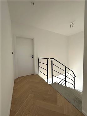 Exklusive und stilvolle Duplexwohnung im Erstbezug mit großer Terrasse und Tiefgaragenstellplatz im Herzen von Eupen