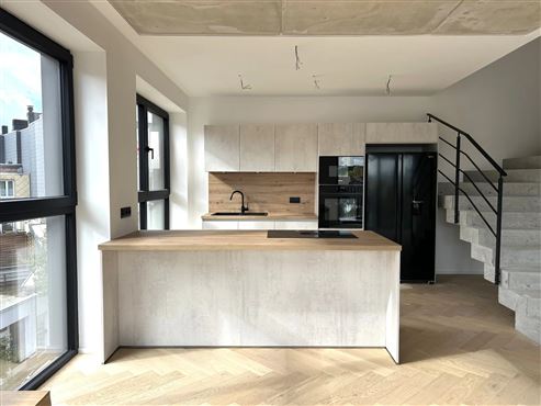 Exklusive und stilvolle Duplexwohnung im Erstbezug mit großer Terrasse und Tiefgaragenstellplatz im Herzen von Eupen