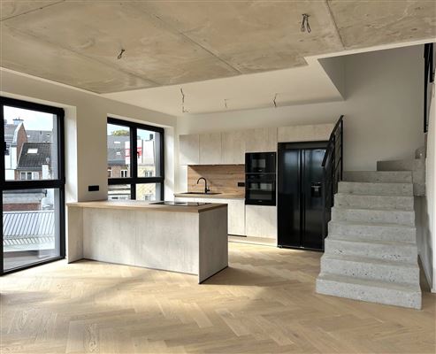 Exklusive und stilvolle Duplexwohnung im Erstbezug mit großer Terrasse und Tiefgaragenstellplatz im Herzen von Eupen
