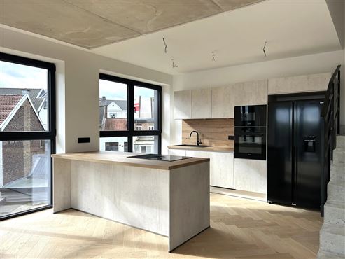 Exklusive und stilvolle Duplexwohnung im Erstbezug mit großer Terrasse und Tiefgaragenstellplatz im Herzen von Eupen