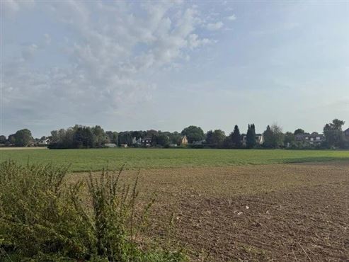 Strategische Grundstücksinvestition – ca. 6 Hektar landwirtschaftliche Fläche in einer ZACC-Zone vor den Toren von Lüttich